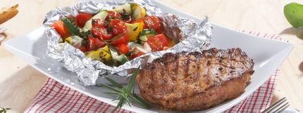 Angerichtes Gericht für das Rezept Latten-Kracher vom Schweinehals mit Grillgemüse