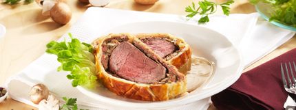 Angerichtes Gericht für das Rezept Filet Wellington mit Sahnesauce